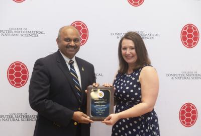 CMNS Dean Amitabh Varshney presenting Victoria Fitzgerald with the award