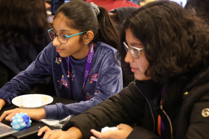 photo of Two Technica participants work on a project during the 24-hour hackathon at the College Park Marriott Conference Center in College Park, Md., on Saturday, Nov. 16, 2025.