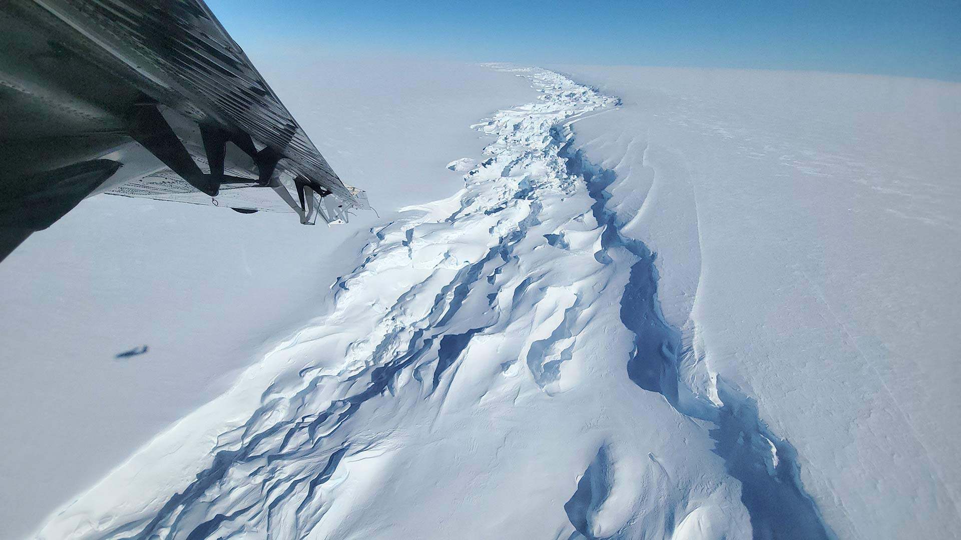 The rift on the Ross Ice Shelf as seen from a plane. A trio of geology researchers braved wind, snow and wind chills in the single digits to collect valuable data in Antarctica.