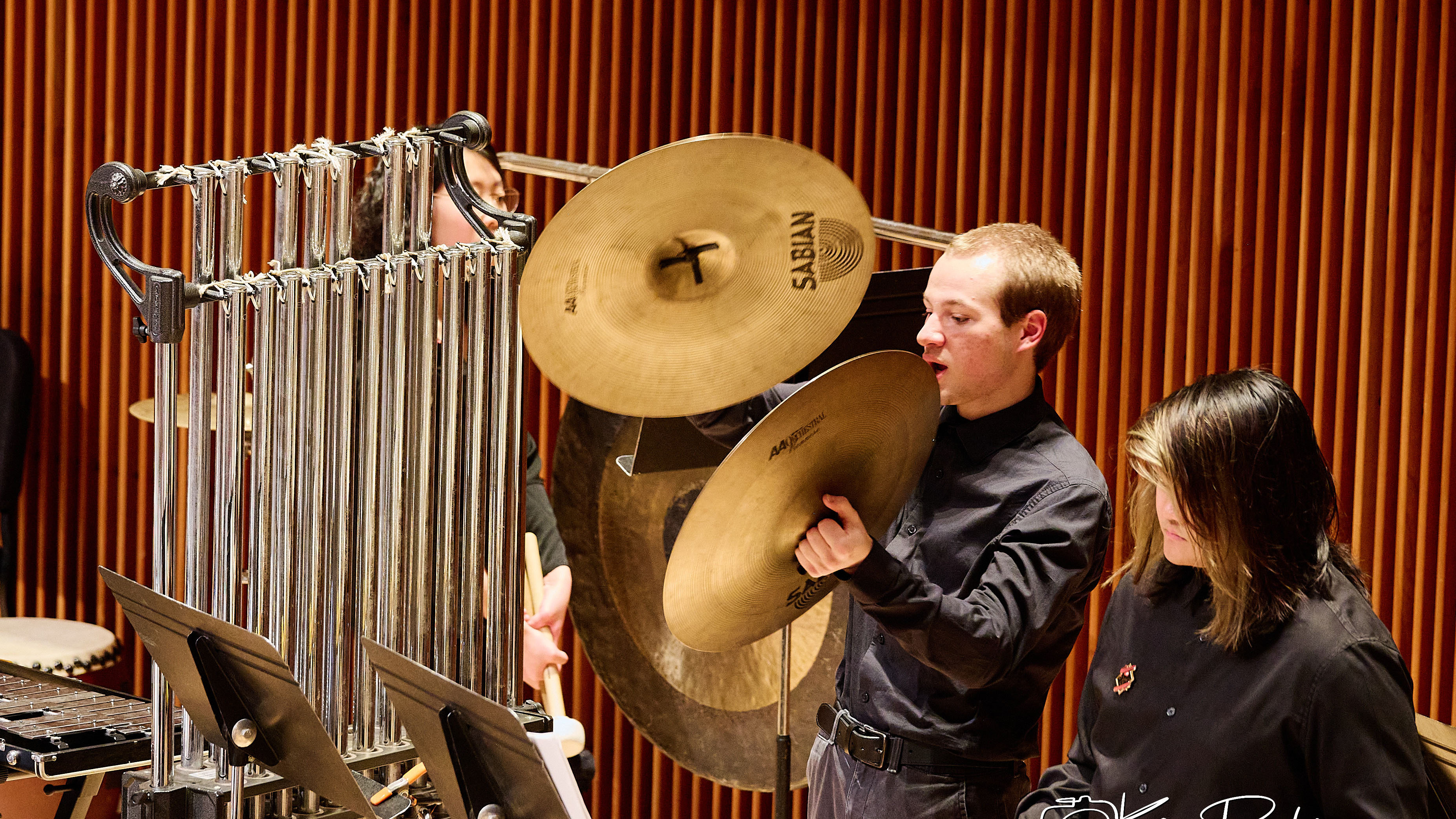Man playing cymbals.