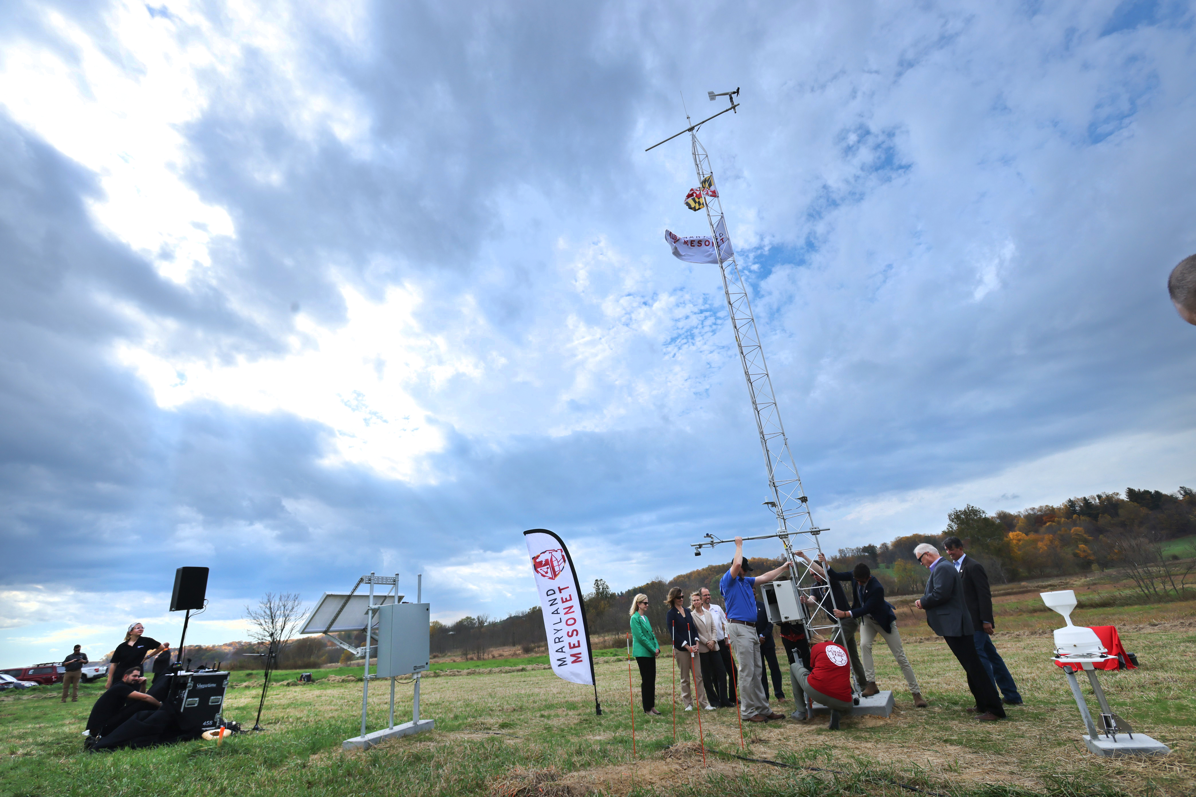 A team of researchers and graduate students set up the first tower of the Maryland Mesonet network.