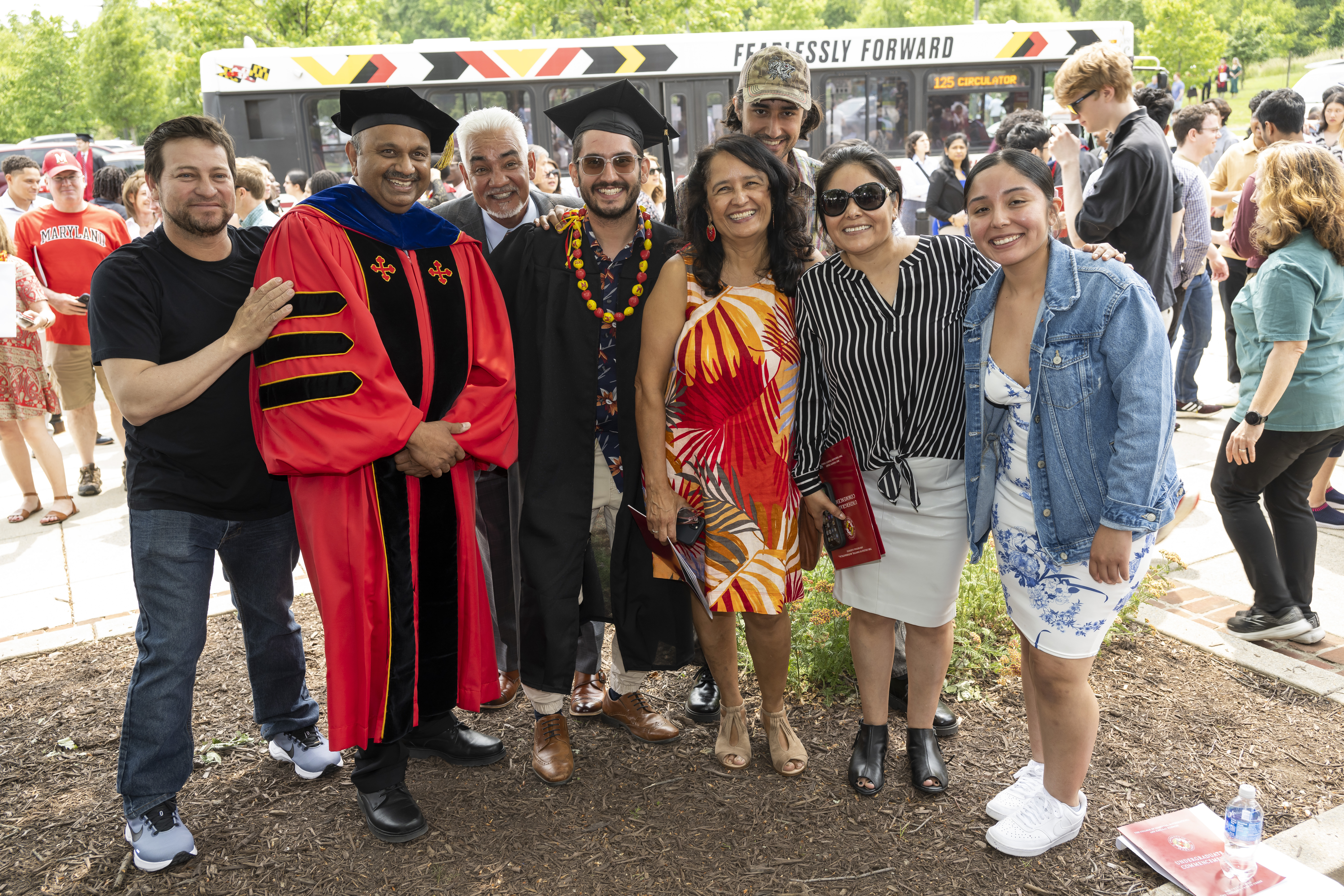 Dean Amitabh Varshney poses with family of graduate
