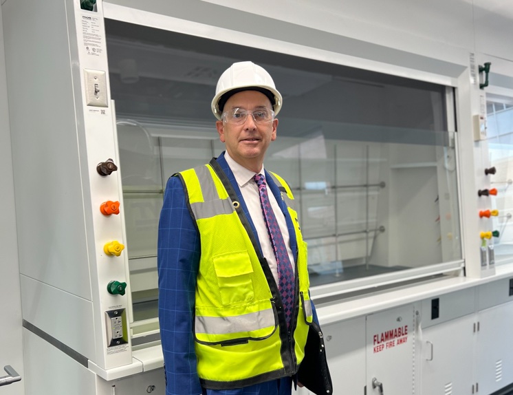 Robert Bob Infantino touring the new Chemistry Building while it was under construction