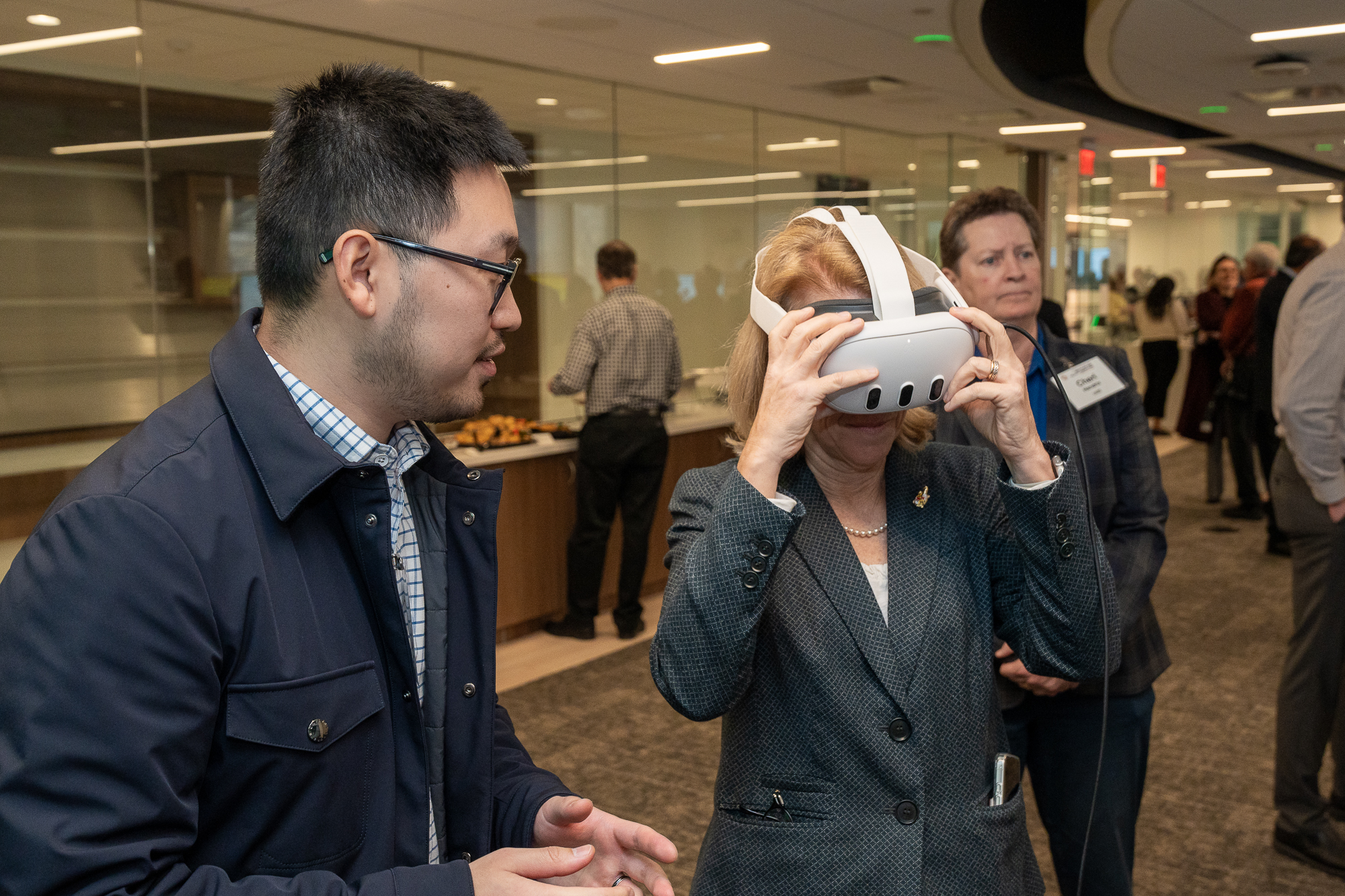 Provost Jennifer King Rice trying VR demo