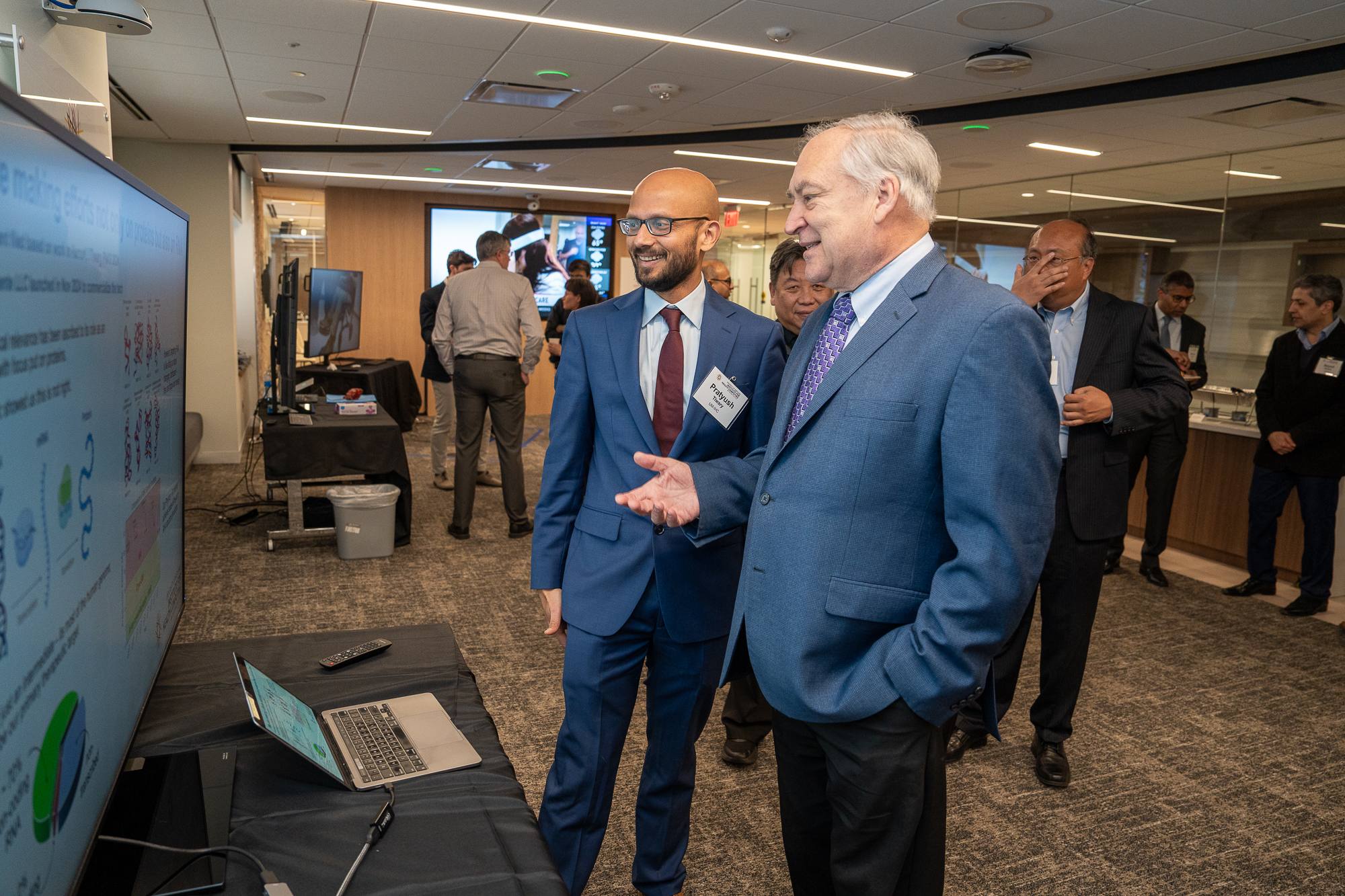 Professor Pratyush Tiwary sharing research with Montgomery County Executive Mark Elrich