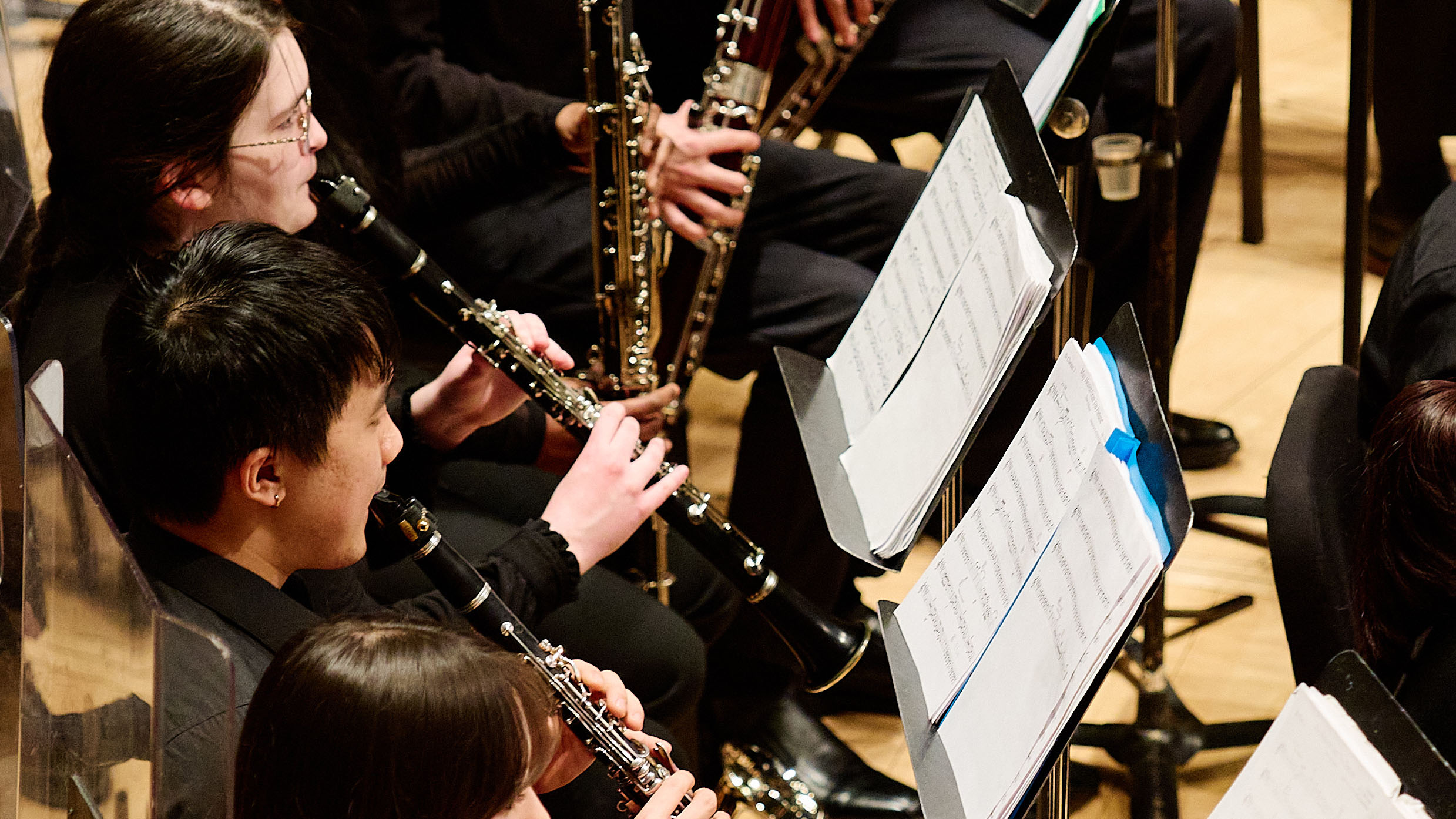 Musicians playing clarinets.