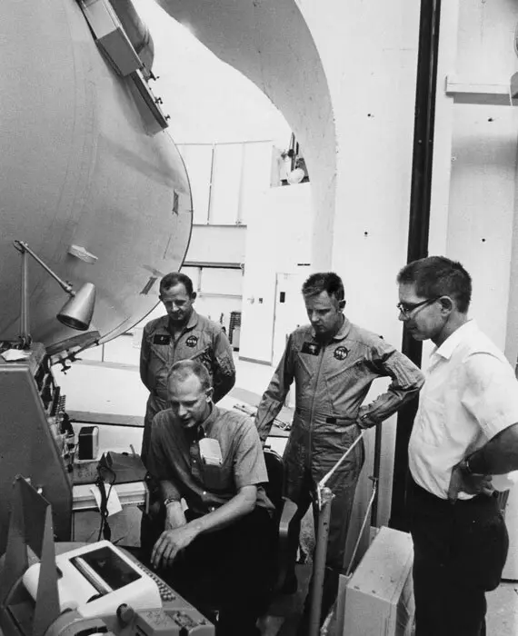 In an undated photo, Currie (seated) discusses the project with astronauts and astronomers at the McDonald Observatory in Texas.