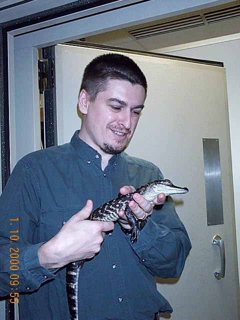 Jonathan Simon as a C-CEBH trainee, holding an alligator