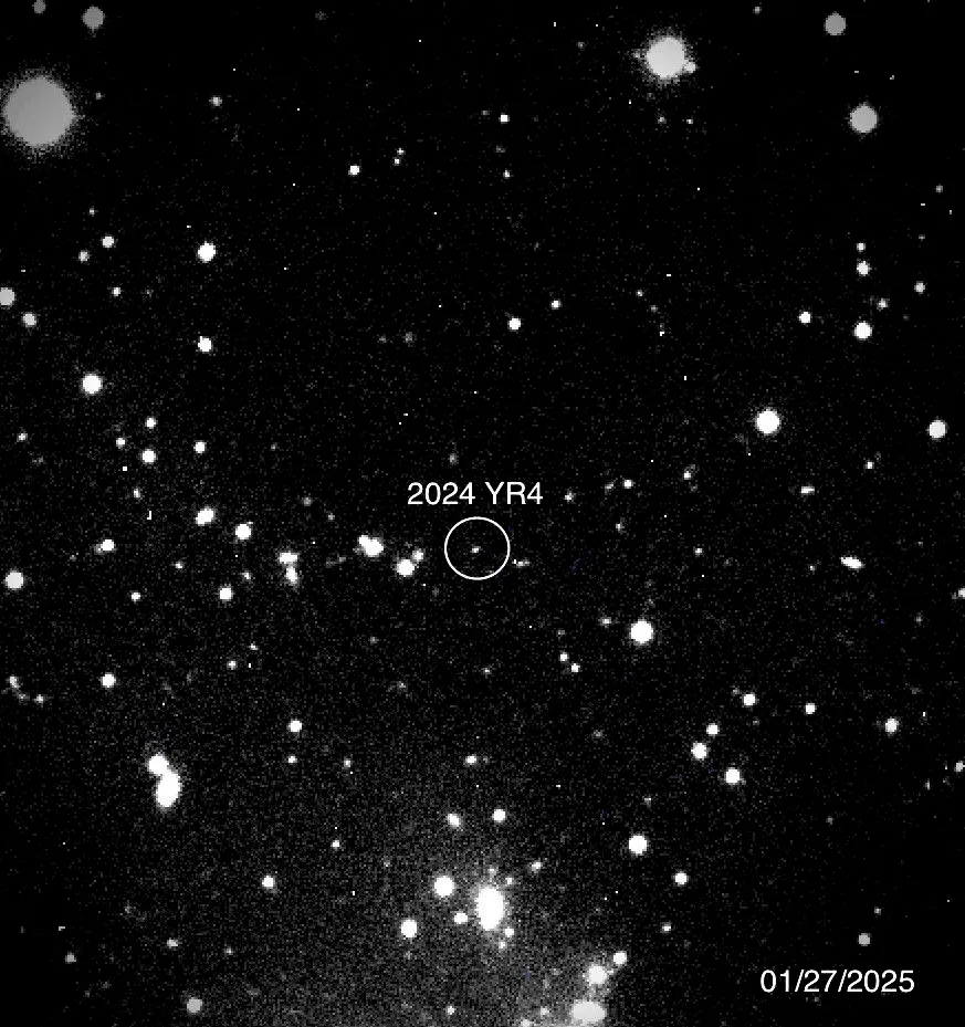 Telescope image of stars in the darkened sky
