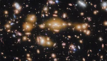 UMD Astronomers Help Discover Compact Star Clusters in Distant, Infant Galaxy