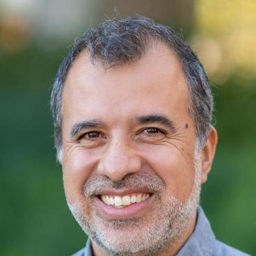 Carlos Machado headshot