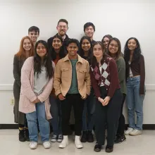 Team Fungi students pose with Myles Poulin