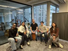 Goodshuffle Sprinterns sitting with their supervisor