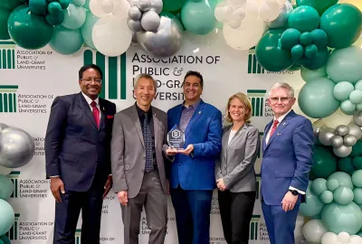 From left, UMD President Darryll J. Pines, Chief Innovation Officer Dean Chang, Innovation & Entrepreneurship Ecosystem Catalyst Sammy Popat, Senior Vice President and Provost Jennifer King Rice and Vice President for Research Patrick O'Shea accept the Association of Public and Land-grant Universities’ 2025 Innovation & Economic Prosperity Innovation Award.