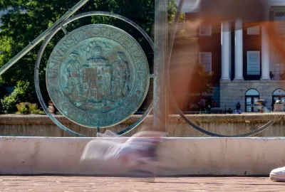 blurred image of students walking