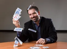 Matt Baker with flying cards