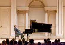 Jacob Goldman performing piano on stage at Carnegie Hall. Photo courtesy of Jacob Goldman.