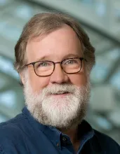 Evolutionary Biologist Sean B. Carroll, bearded with glasses.