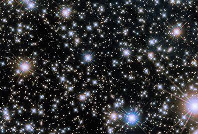 A view from Hubble Space Telescope shows a dazzling display of lights in the sky, including the afterglow of GRB 221009A