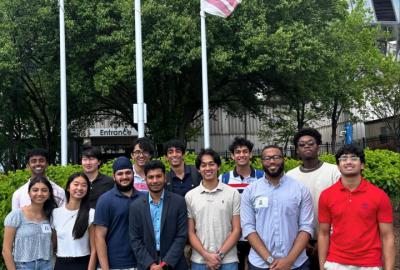 A group of University of Maryland students standing outside a building.