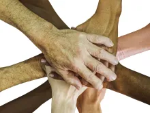 Hands on top of each other