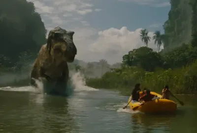 T. rex pursues a boat full of people in "Jurassic Park Rebirth."