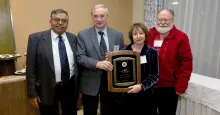 Professor Emeritus Michael Brin and Eugenia Brin, shown in an undated photo flanked by former College of Computer, Mathematical, and Natural Sciences Dean Jayanth Banavar and former Department of Mathematics Chair Jim Yorke, have been major supporters of the University for nearly 20 years.  Photo courtesy of CMNS