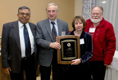 Professor Emeritus Michael Brin and Eugenia Brin, shown in an undated photo flanked by former College of Computer, Mathematical, and Natural Sciences Dean Jayanth Banavar and former Department of Mathematics Chair Jim Yorke, have been major supporters of the University for nearly 20 years.  Photo courtesy of CMNS