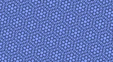 Two hexagonal grids, which individually reflect the structure of carbon joined into sheets of graphene, create repeating patterns when rotated relative to each other. (Credit: Paul Chaikin with modifications by Bailey Bedford)