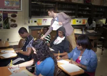 Teacher in classroom with students