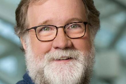 Evolutionary Biologist Sean B. Carroll, bearded with glasses.