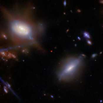 The red dot in the center is the galaxy JADES GS-z13-1, which existed very early in the universe. The JWST observed the galaxy as it existed approximately 13.5 billion years ago, just 330 million years after the big bang. 