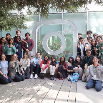 QUEST students pose with the Instagram logo at the Meta campus