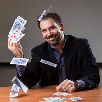 Matt Baker with flying cards
