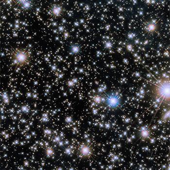 A view from Hubble Space Telescope shows a dazzling display of lights in the sky, including the afterglow of GRB 221009A