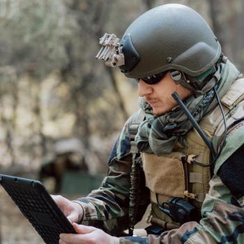 Bearded soldier on tablet