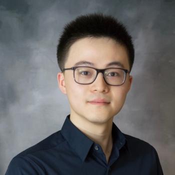 Assistant Professor in Computer Science Ruohan Gao in dark shirt and glasses.