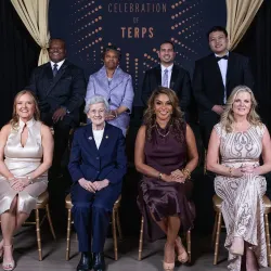 Vice President for University Relations Jim Harris (far left) and Alumni Association Board of Governors President Bert D. Williams '96 and UMD President Darryll J. Pines (far right) flank the 2025 honorees of "A Celebration of Terps." Back row, from left: Margot Thomas '90, Omar Tarabishi ’13, M.A. ’20 and Kevin J. Tu ’23, ’23. Front row: Alumni Association Executive Director Jessica Roberts, Rita R. Colwell, Dawn Flythe Moore '97 and Jackie Cardello ’93.