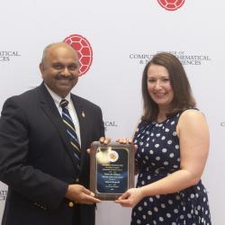 CMNS Dean Amitabh Varshney presenting Victoria Fitzgerald with the award