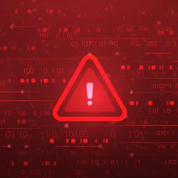 Red caution sign surrounded by binary code
