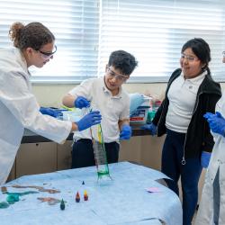 UMD students visit Langley Park Elementary for a chemistry outreach event