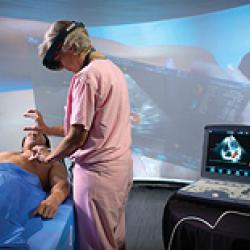 A surgeon using augmented reality to practice surgery on a mannequin