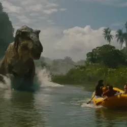 T. rex pursues a boat full of people in "Jurassic Park Rebirth."