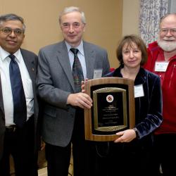 Professor Emeritus Michael Brin and Eugenia Brin, shown in an undated photo flanked by former College of Computer, Mathematical, and Natural Sciences Dean Jayanth Banavar and former Department of Mathematics Chair Jim Yorke, have been major supporters of the University for nearly 20 years.  Photo courtesy of CMNS